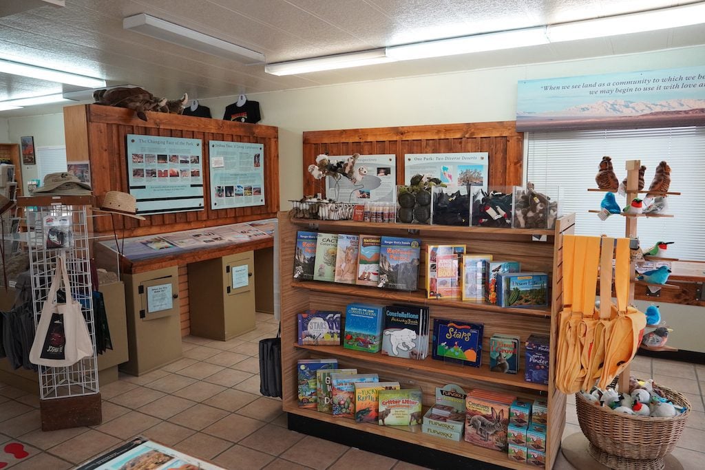 Many children books on the bookshelf inside the visitor center in Joshua Tree National Park