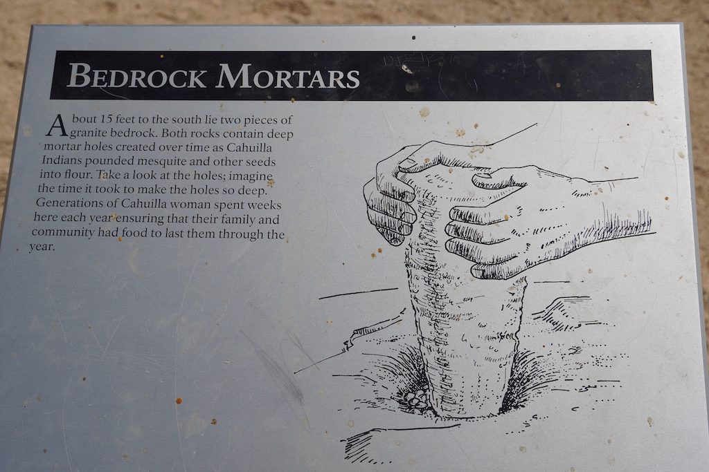 The signboard that explains about bedrock mortars.