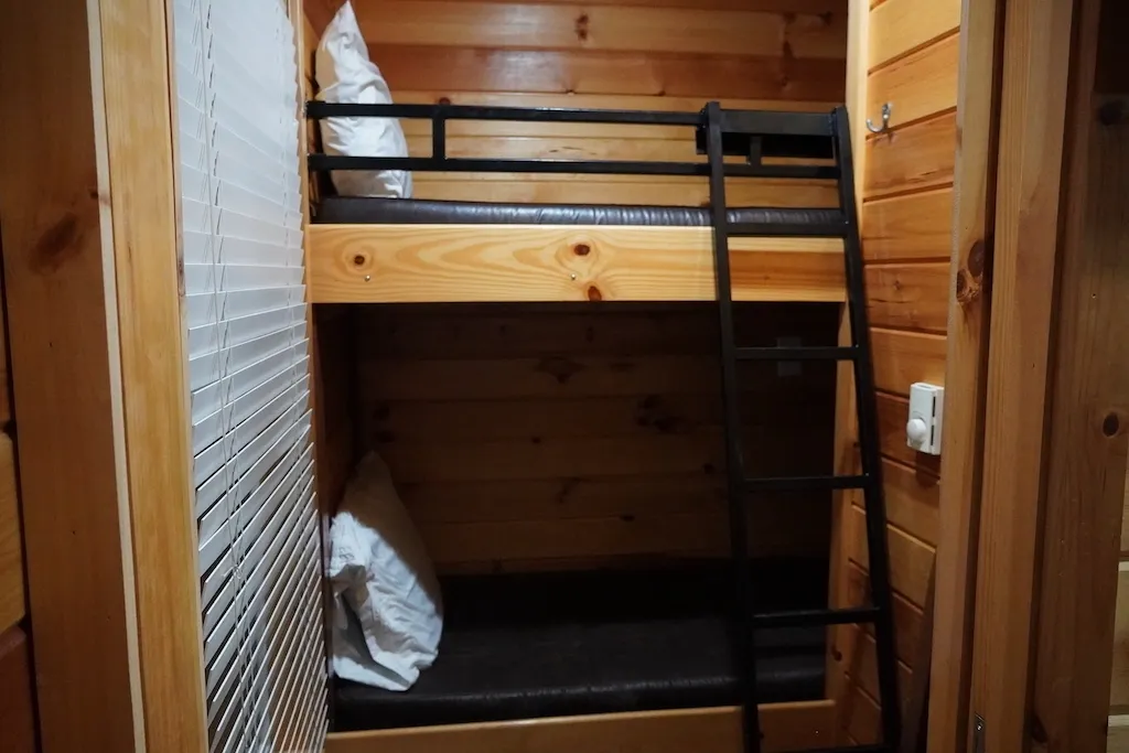 A bunk bed inside the cabin at KOA Barstow and Calico.