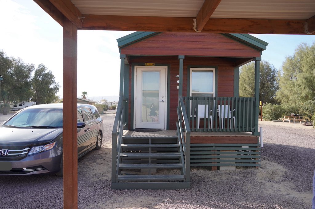 Cabin and mini van at KOA Barstow and Calico.
