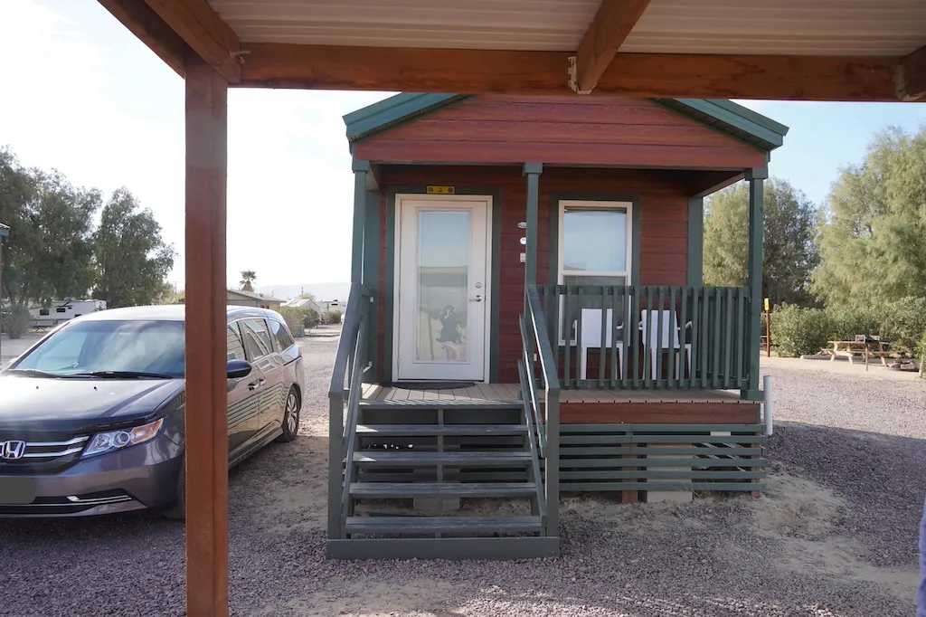 Cabin and mini van at KOA Barstow and Calico.