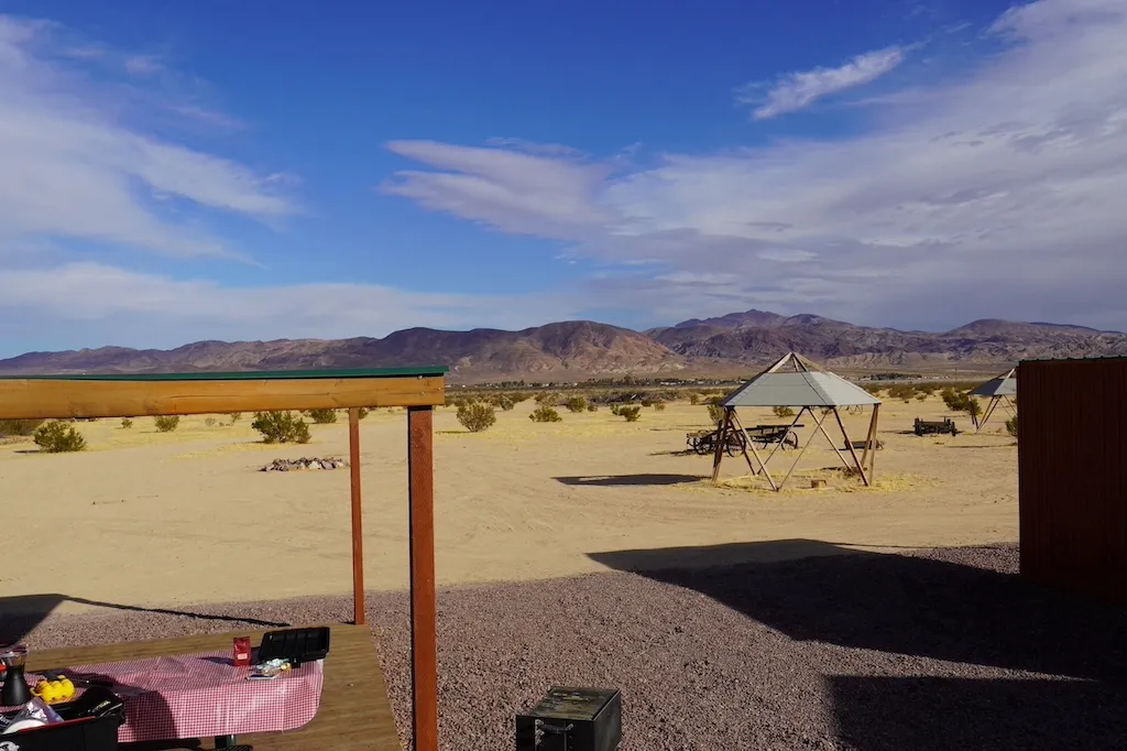 The great view of the outside of KOA Barstow and Calico with mountains in the back.