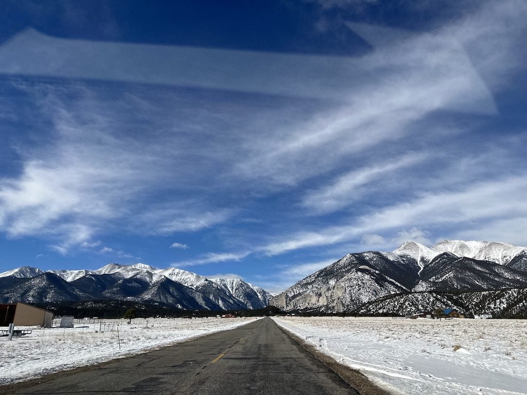 Mt Princeton Hot Springs View - Tomo Travel & Camping A straight road to beautiful snow covered mountains.