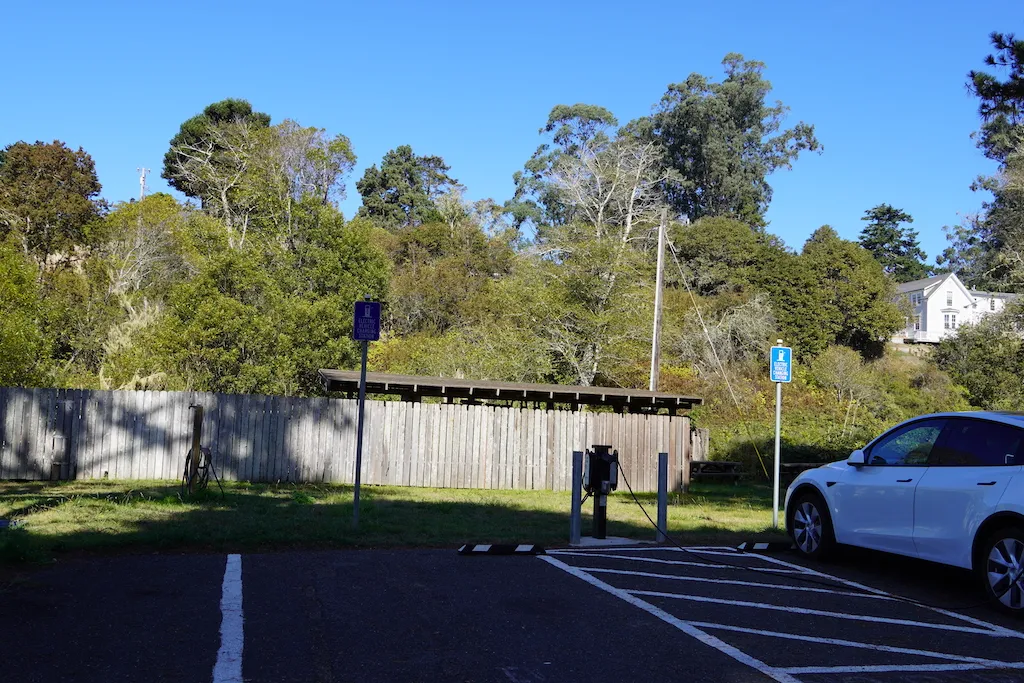 The electric vehicles charging station in the parking lot of Van Damme State Park Campground in California.