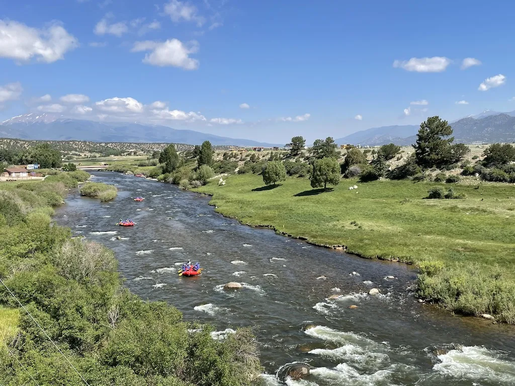Some rafters are seen in the river by Browns Canyon Adventure Park in Salida.