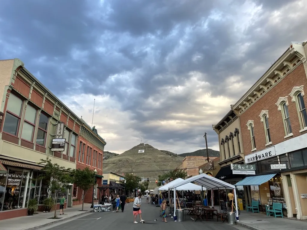 People are hanging out on the shopping street in Salida Downtown.