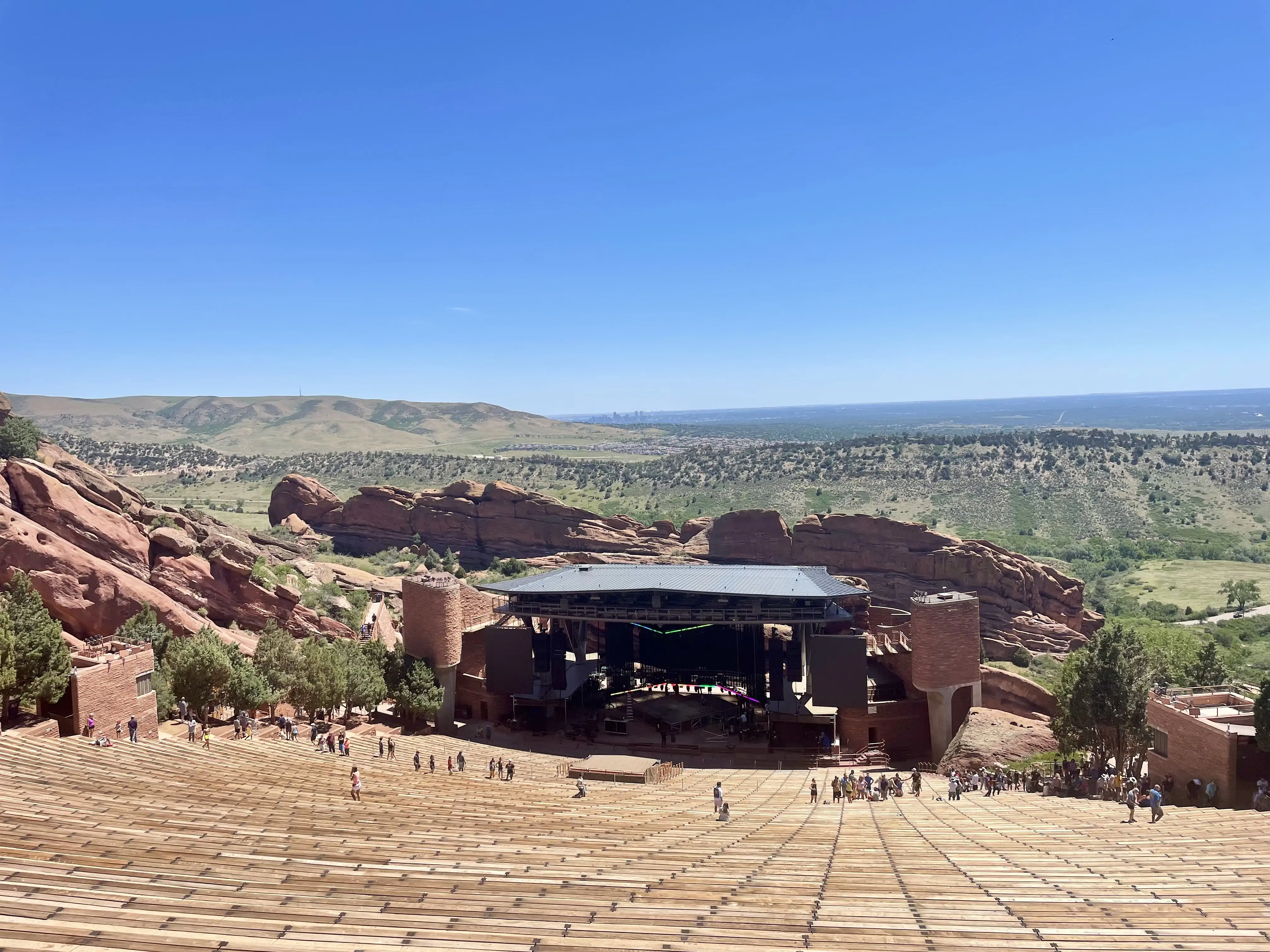 An open-air theater surrounded by red soil