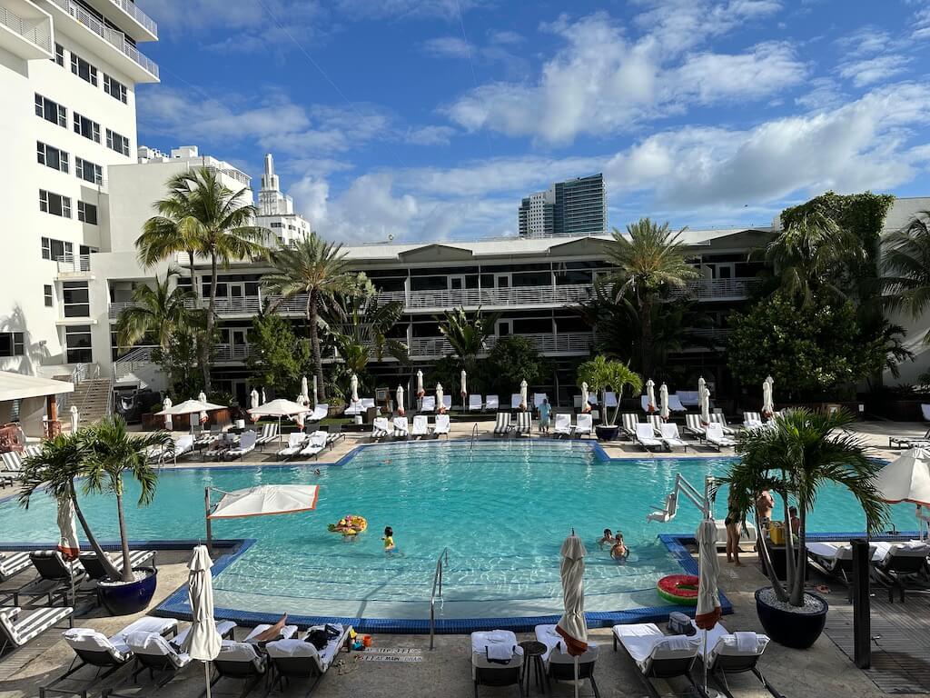 FHR_Ritz Carlton South Miami - Tomo Travel & Camping The Versailles gardens, viewed from the palace, are a stunning display of French formal design, featuring symmetrical lawns, vibrant flower beds, sculpted hedges, and shimmering fountains that blend gracefully into the horizon.