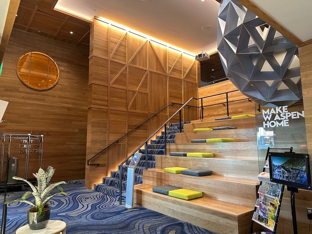 FHR_W Aspen - Tomo Travel & Camping Fancy and wooden staircase at the entrance of W Aspen in Colorado.