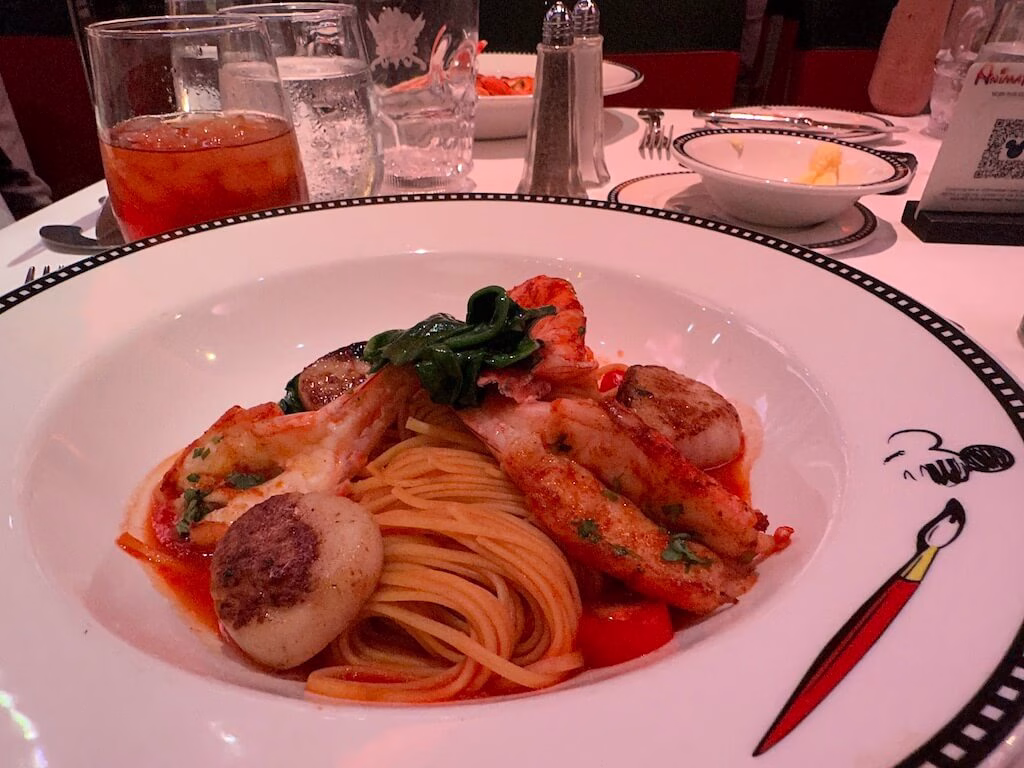 Tomato-based shrimp pasta served at Animator's Palate, a restaurant on Disney Cruise Line.