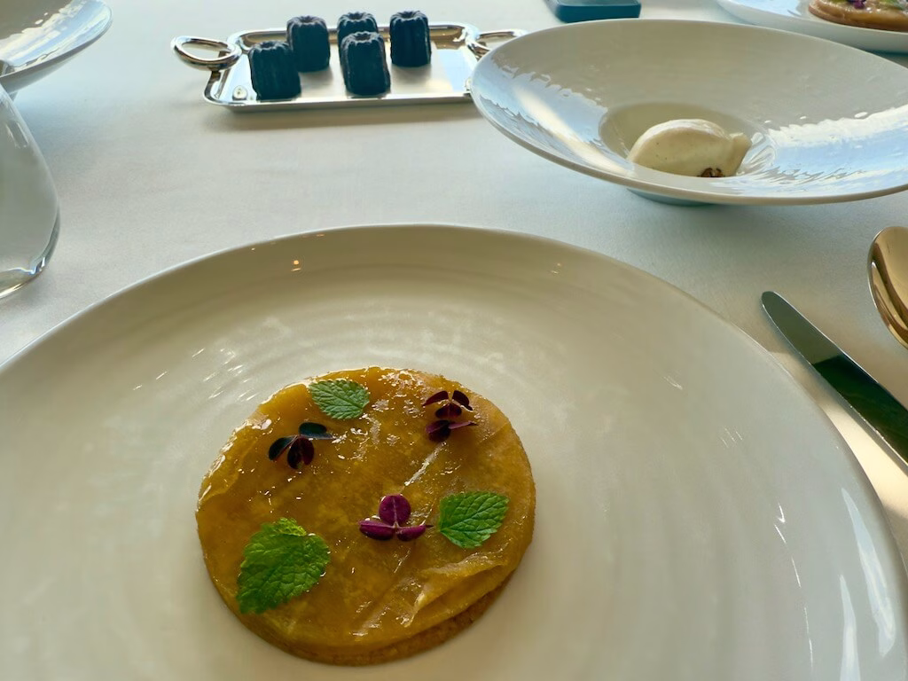 Thinly sliced apple tart with rich butter served at Remy, the French restaurant on the Disney Cruise.