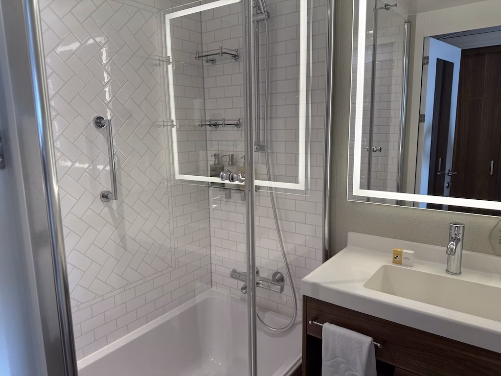 The bathroom in a veranda stateroom aboard the Disney Wish cruise ship.