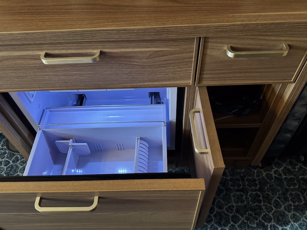 The mini refrigerator inside a stateroom on the Disney Wish cruise ship.
