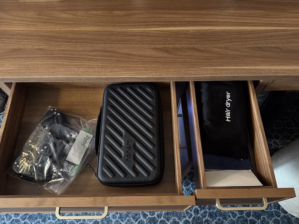 The drawer containing a hair dryer inside a stateroom on the Disney Wish cruise ship.
