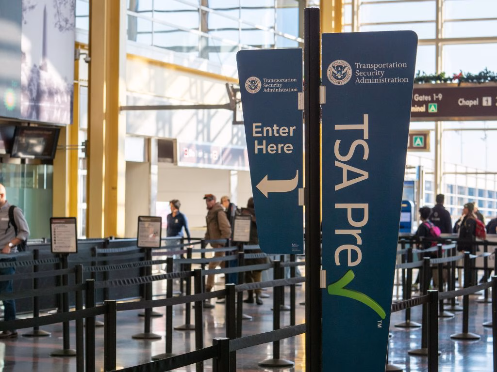 TSA PreCheck dedicated security lane at a U.S. airport, offering faster screening for approved travelers through programs like Global Entry and TSA PreCheck.