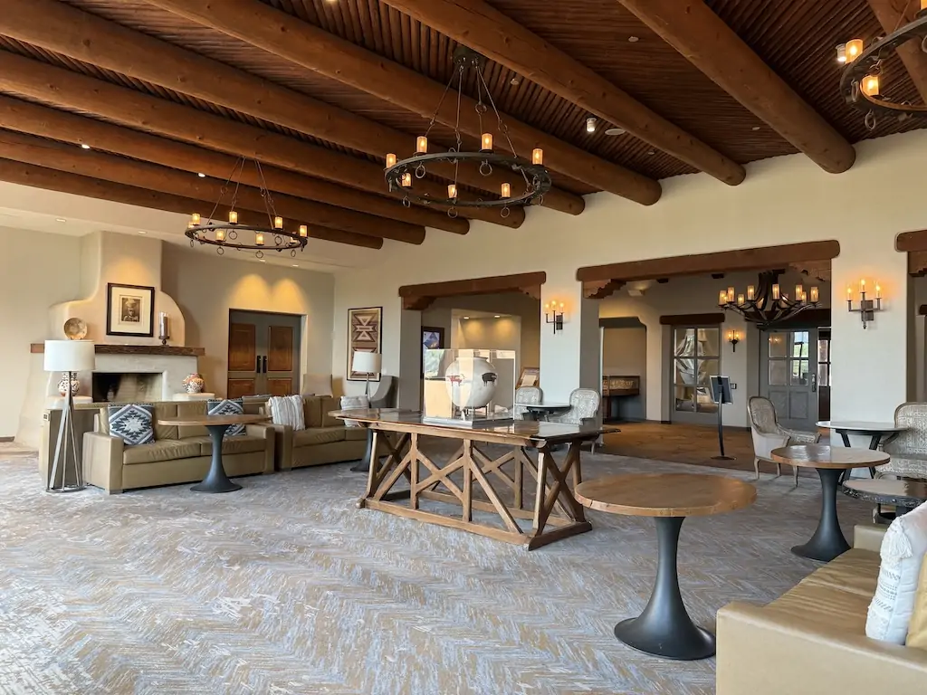 Spacious lobby at Hyatt Regency Tamaya Resort near Santa Fe, featuring Southwestern architecture, rustic wooden beams, and cozy adobe-style décor—ideal for travelers exploring things to do in Santa Fe or visiting Meow Wolf Santa Fe.