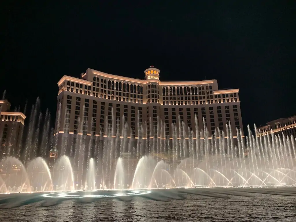 The Bellagio Hotel and its famous fountain show at night in Las Vegas, a must-see family attraction on the Strip